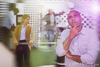 Pensive man solving conundrum in quest room Stock Photo