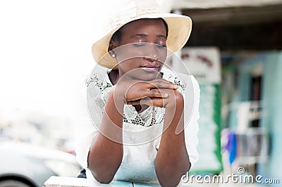 Pensive young woman in concentration. Stock Photo