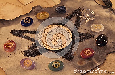 Pentagram symbol with chakras of human body and crystals Stock Photo