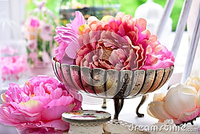 Peony flowers in antique silver bowl Stock Photo