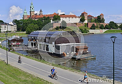 People actively rest on the Vistula waterfront. Editorial Stock Photo