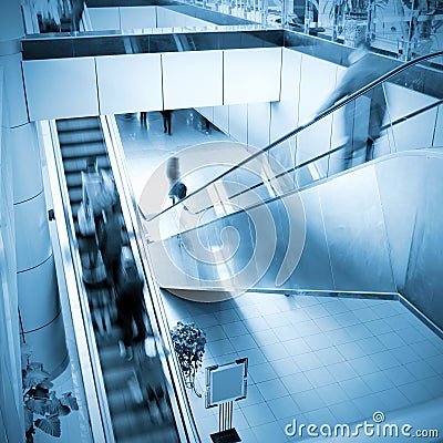 People at the airport escalator Stock Photo