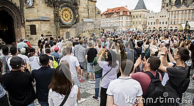 People around the Prague Clock Tower at the Old Town Square, June 16, 2019 Editorial Stock Photo