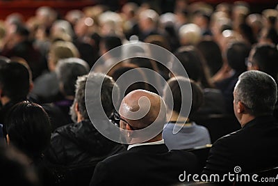 People in the audience watching a classical concert inside a hall Editorial Stock Photo