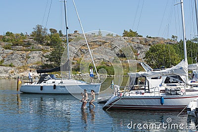 People bathing in Guest harbour Stockholm archipelago Editorial Stock Photo