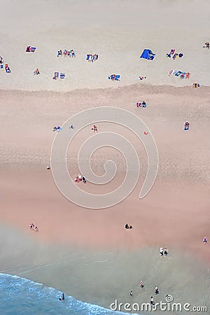 People on a beach from high above Stock Photo