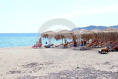 People beach parasols, Sarti, Chalkidiki, Greece Editorial Stock Photo