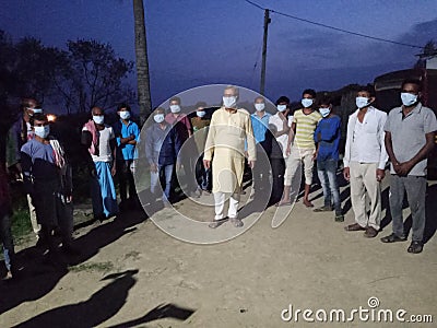 People bearing face mask to defeat covid 19 in madhubani India Editorial Stock Photo