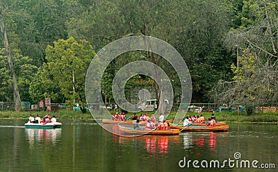 People boat riding at the kodaikanal lake near the boat house. Editorial Stock Photo