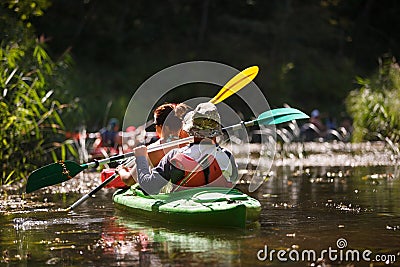 People boating on river Stock Photo