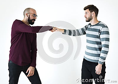 People bumping their fists together Stock Photo