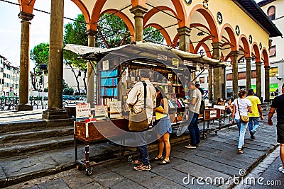 People buying books in Florence Editorial Stock Photo