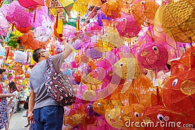 People buying Chinese traditional lantern to celebrate the Mid-autumn festival Editorial Stock Photo