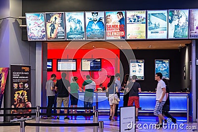 People Buying Tickets At The Cinema Editorial Stock Photo