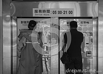 People buying tickets at train station in Tainan, Taiwan Editorial Stock Photo