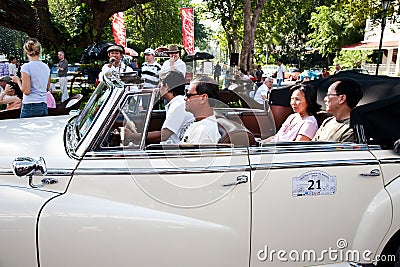 People in the car on Vintage Car Parade Editorial Stock Photo