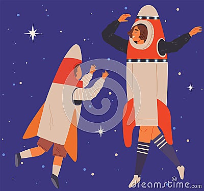 People in cardboard or plastic rocket suits. Men and child in self made costumes dancing in space Stock Photo