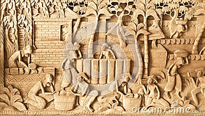 People carved on wood Stock Photo