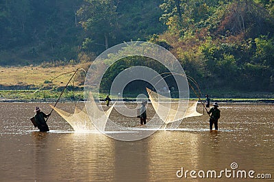 People catch fish by lift net on ditch Editorial Stock Photo