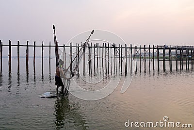 People catch fish near Ubein bridge in Mandalay, Myanmar Editorial Stock Photo