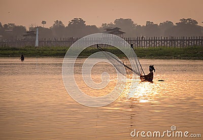 People catch fish on the river in Yangon, Myanmar Editorial Stock Photo
