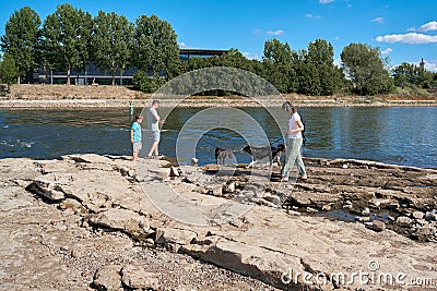 People on the cathedral-Rock on the river Elbe in Magdeburg. Editorial Stock Photo