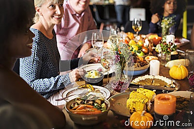 People Celebrating Thanksgiving Holiday Tradition Concept Stock Photo