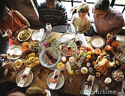 People Celebrating Thanksgiving Holiday Tradition Concept Stock Photo