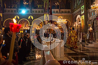 People during celebration of Orthodox Easter Holy Saturday is often the only time that the Midnight Office will be read in Editorial Stock Photo