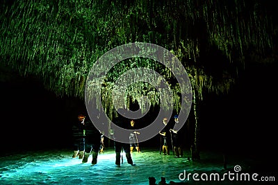 People in cenote cave with underground water system at Rio secreto, Mexico Editorial Stock Photo