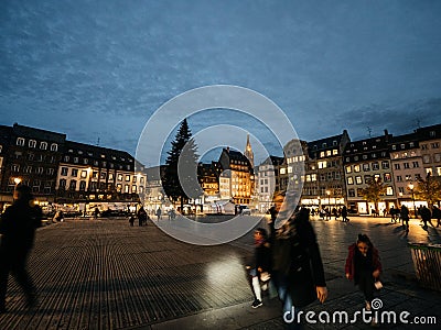 People in central Place Kleber with CHristmas Tree in background Editorial Stock Photo