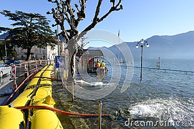 People of civil Protection pumping water of the inundation of la Editorial Stock Photo