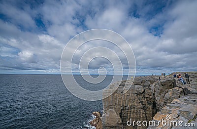 People on the Cliffs of Burren Editorial Stock Photo