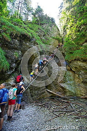 People are climbing in Slovak Paradise Editorial Stock Photo