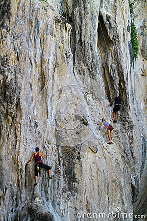 People climbing up a Big Rock - Thailand Editorial Stock Photo