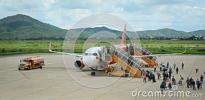 People coming to airplane at the airport in Hai Phong, Vietnam Editorial Stock Photo