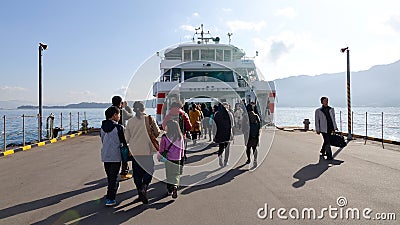 People coming to the boat in Hiroshima, Japan Editorial Stock Photo