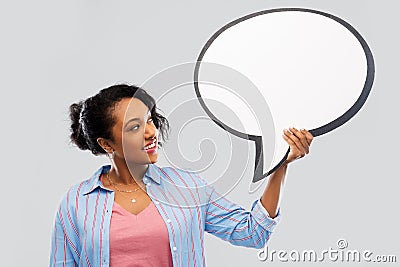 Happy african american woman holding speech bubble Stock Photo