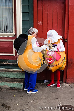 People in Costume Celebrating Mardi Gras Day in the Marigny Editorial Stock Photo