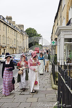 People costumed in the streets of Bath for the Jane Austen festival Editorial Stock Photo