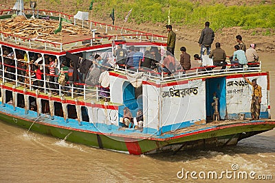 People cross Padma river on Daulatdia ferry boat at Chhota Dhulandi, Bangladesh. Editorial Stock Photo
