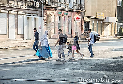 People crossing the road Editorial Stock Photo