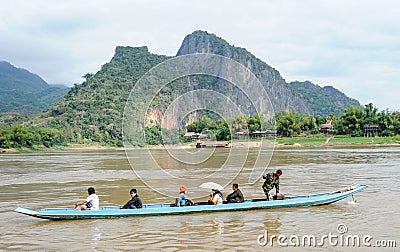 People cruising on a boat in river Mekong Editorial Stock Photo