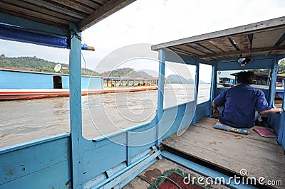 People cruising on a boat in river Mekong Editorial Stock Photo