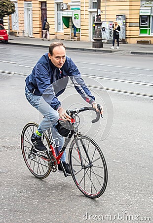 People cycling along the street Editorial Stock Photo