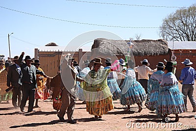 People dance at Fiesta in countryside of Bolivia, Andes Editorial Stock Photo