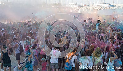 People dancing in colored war event, Larnaca, Cyprus Editorial Stock Photo