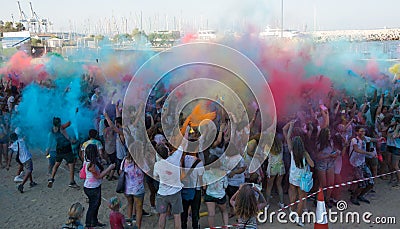 People dancing in colored war event, Larnaca, Cyprus Editorial Stock Photo