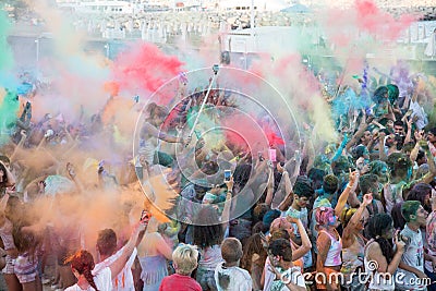 People dancing in colored war event, Larnaca, Cyprus Editorial Stock Photo