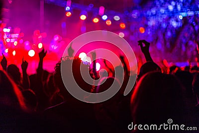 People dancing at concert Stock Photo